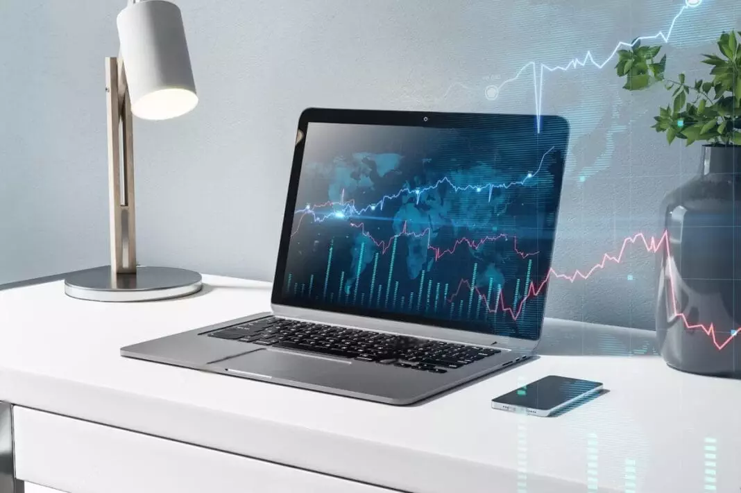 A good laptop showing graphics of stock market graphs